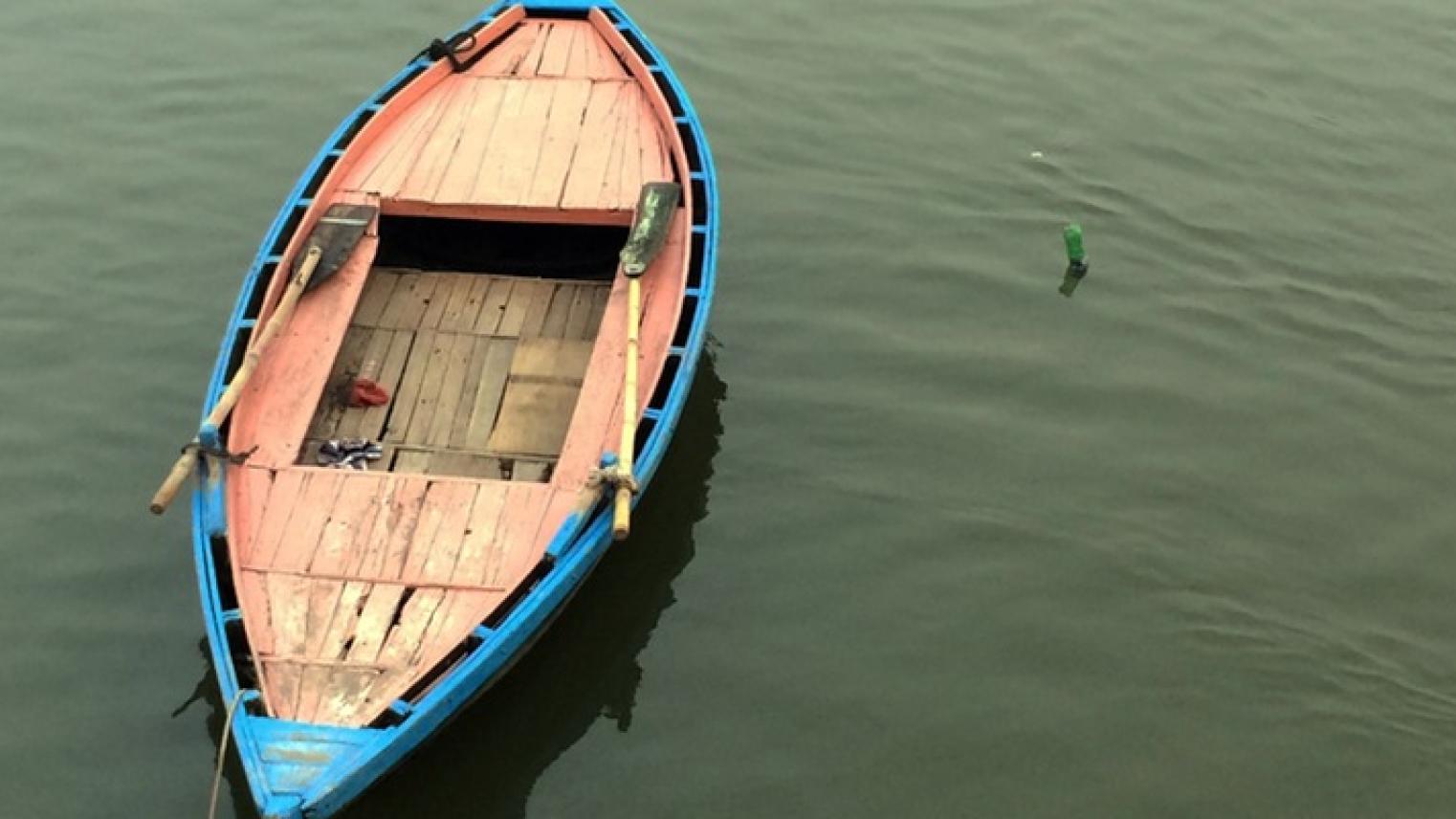 Row boat on still water